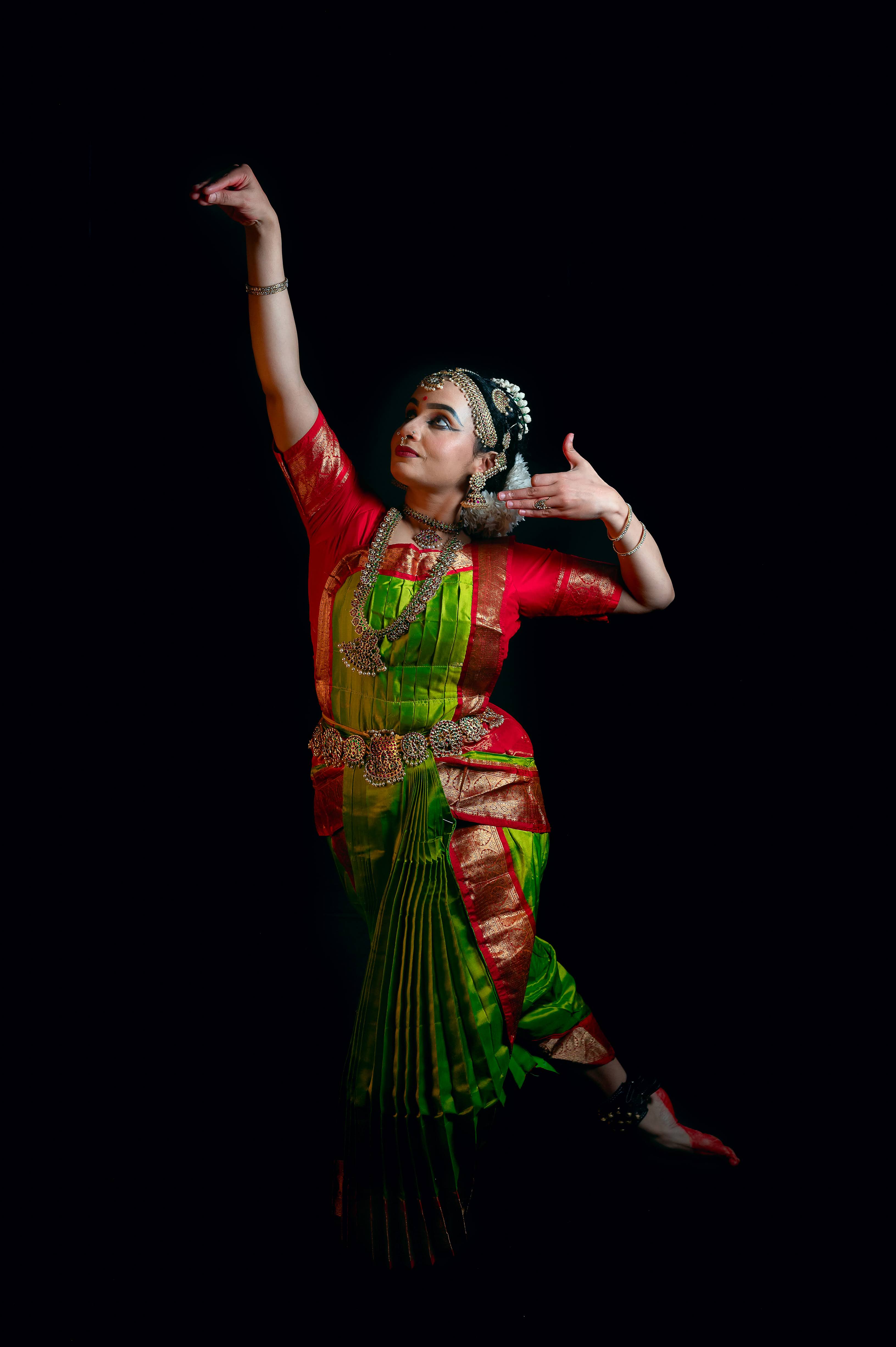 Sherin Jose in a lifted classical mudra pose